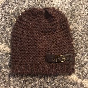 Brown knitted hat with belt on the side